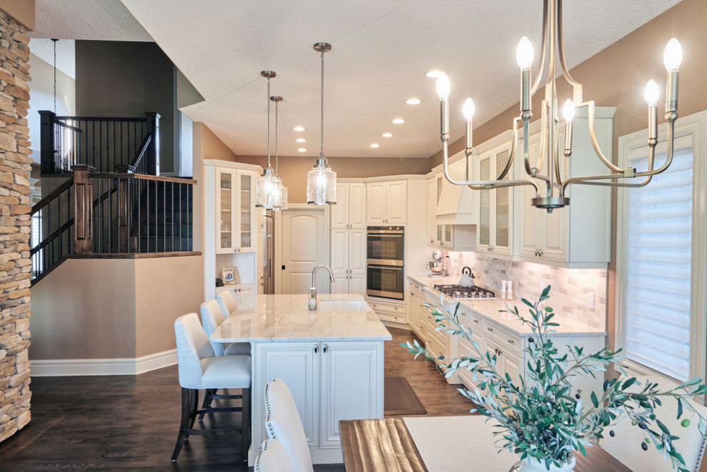 Transitional home design photo in Calgary
