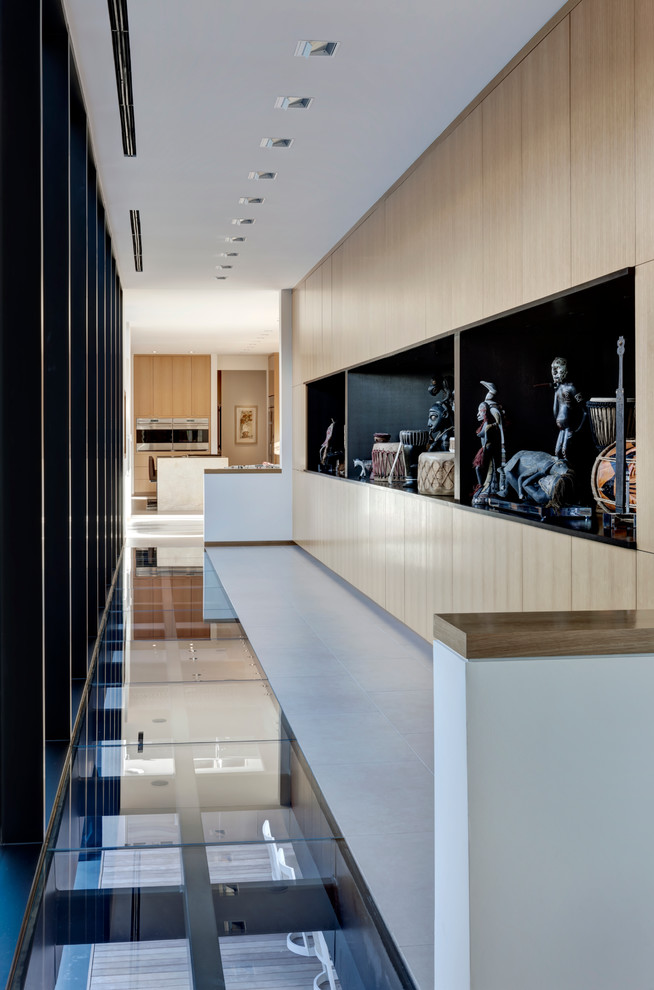This is an example of a large contemporary hallway in Dallas.