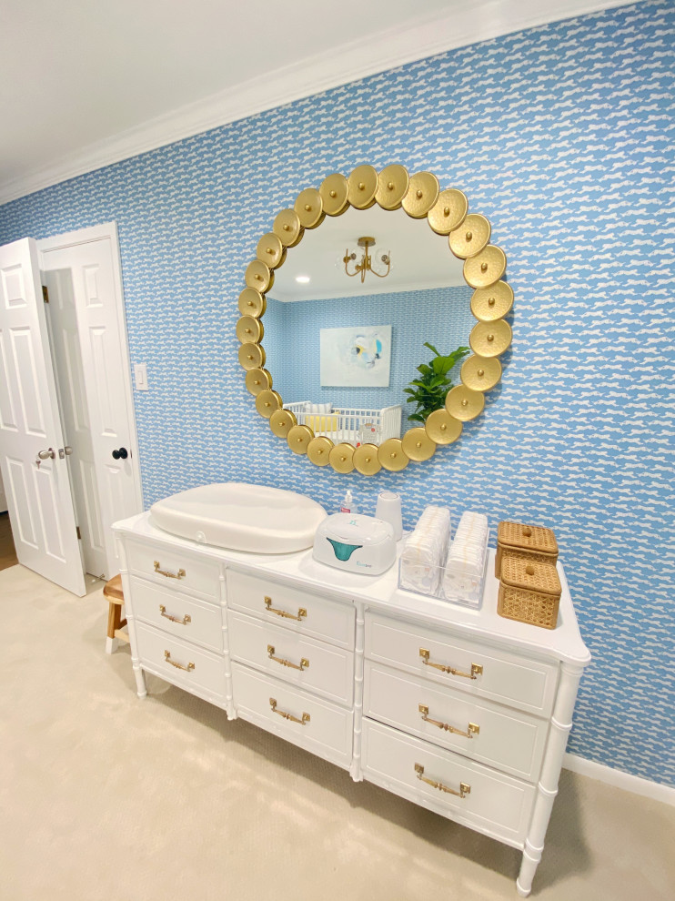 Design ideas for a transitional nursery for boys in Austin with wallpaper.