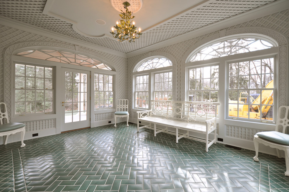 Photo of a traditional sunroom in Newark with green floor.