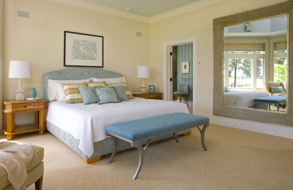 Inspiration for a contemporary master bedroom in DC Metro with beige walls and carpet.