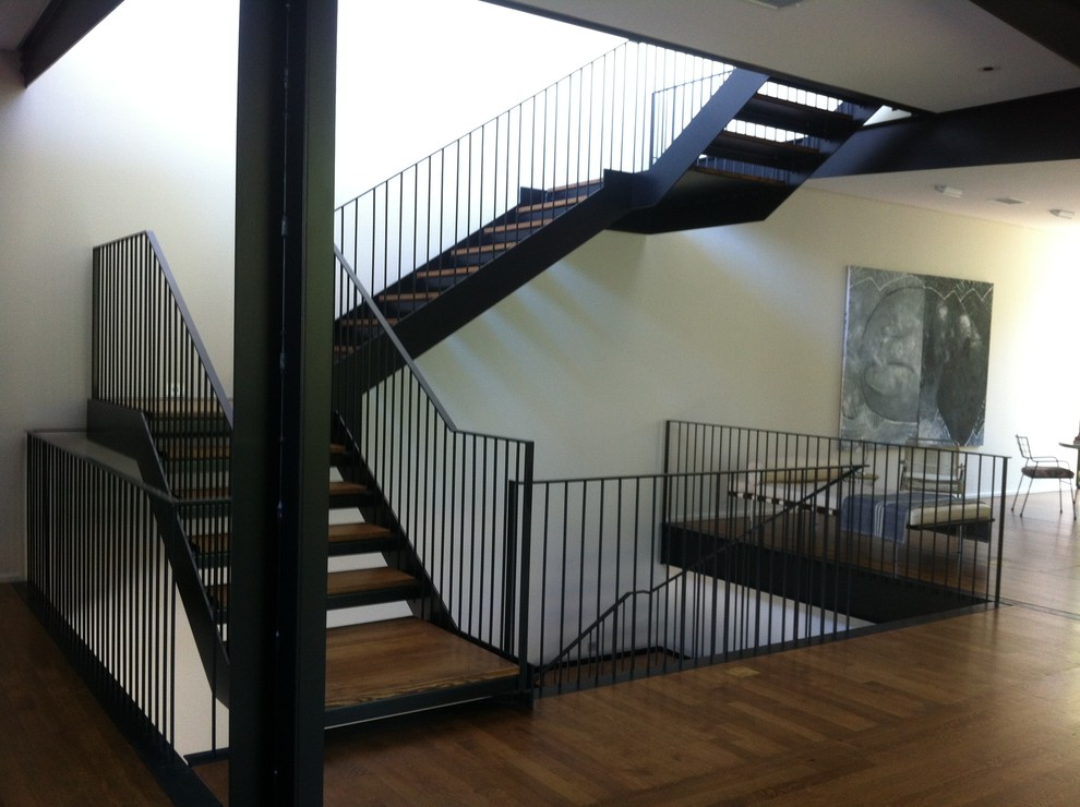 Mid-sized contemporary staircase in Austin.
