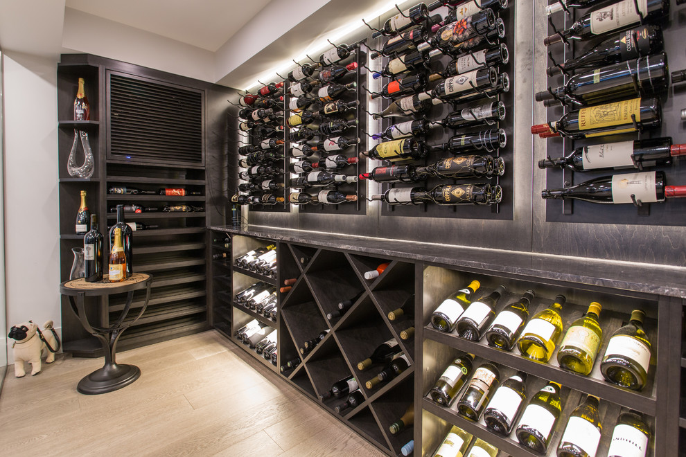 Large contemporary wine cellar in Vancouver with medium hardwood floors and beige floor.