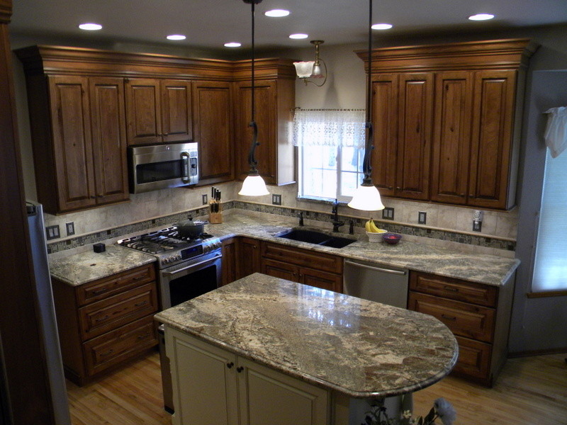 Example of a transitional kitchen design in Denver