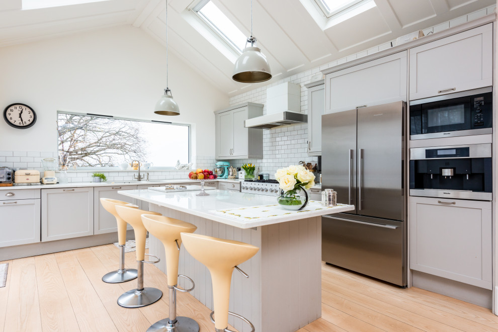 Example of a transitional kitchen design in Dorset