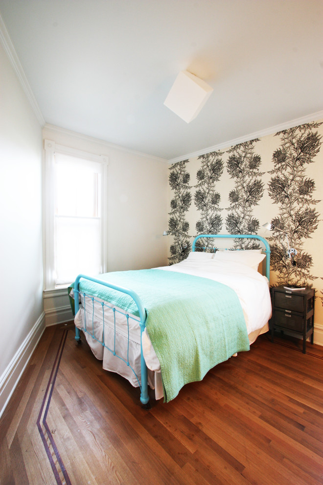 Inspiration for a mid-sized transitional guest bedroom in Portland with white walls.
