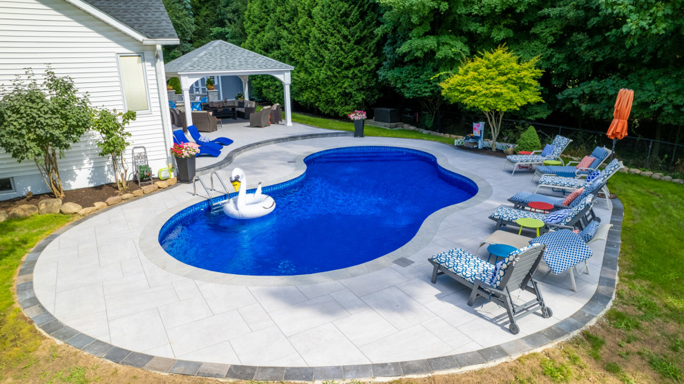 Pool + Patio Area Contemporary Pool New York by Bergen Brick