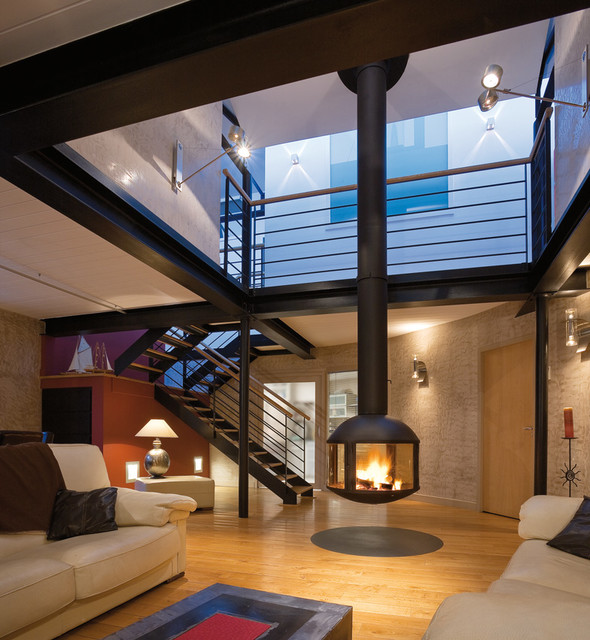 CHEMIN&Eacute;E CENTRALE / CENTRAL FIREPLACE contemporary-vardagsrum