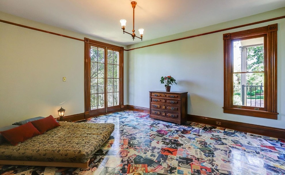 Design ideas for a large traditional bedroom in Sacramento with green walls, vinyl floors, black floor and no fireplace.
