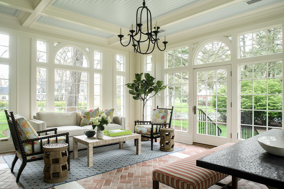 Traditional sunroom in New York with brick floors, a standard ceiling and red floor.