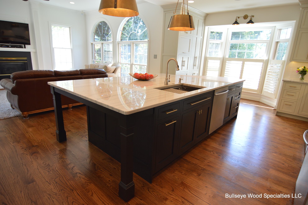 Large transitional u-shaped medium tone wood floor and brown floor eat-in kitchen photo in DC Metro with a single-bowl sink, shaker cabinets, gray cabinets, quartzite countertops, white backsplash, ceramic backsplash, stainless steel appliances, an island and white countertops