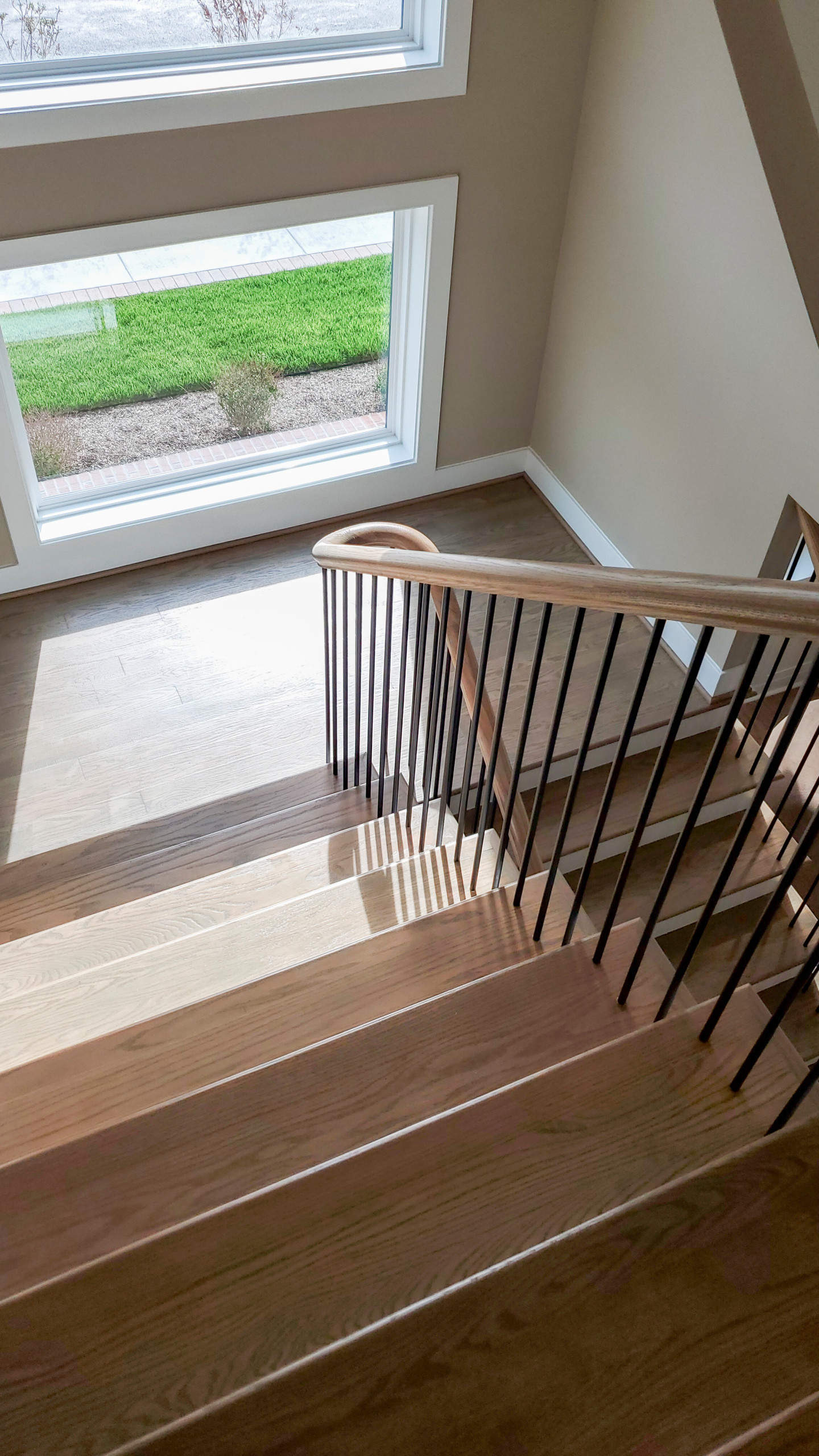Project #153 | Sophisticated Red Oak Stair with Metal Balusters
