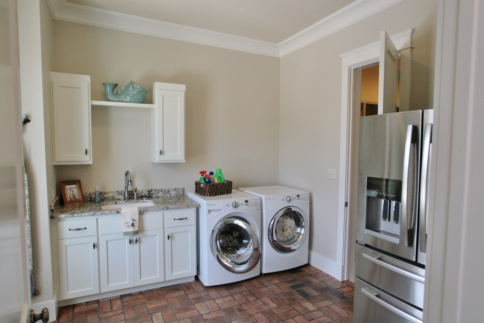 Beach style laundry room in Other.