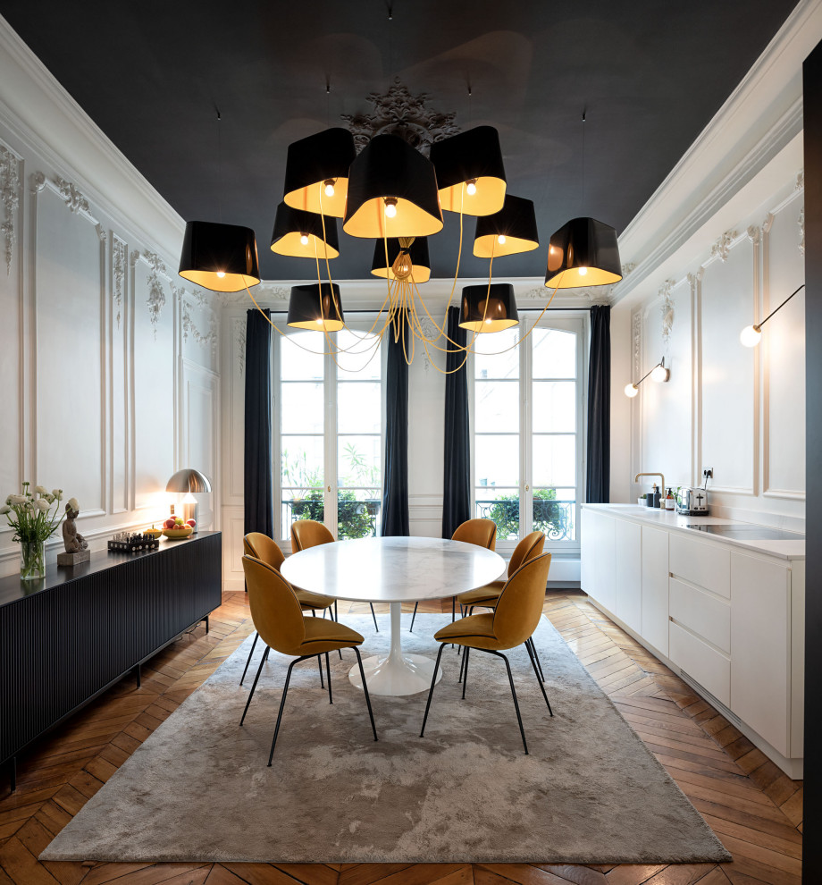 Example of a trendy dining room design in Paris