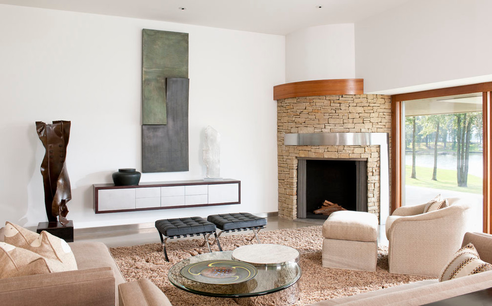 Inspiration for a large midcentury formal open concept living room in Dallas with a corner fireplace, white walls, concrete floors, a stone fireplace surround, no tv and grey floor.