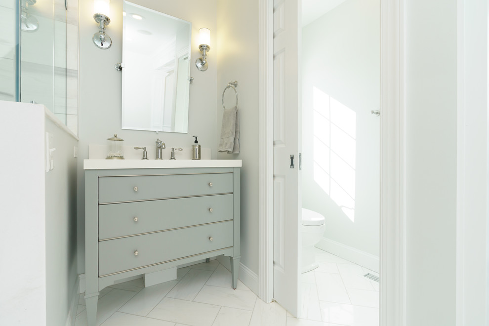 Inspiration for a large contemporary master bathroom in Other with flat-panel cabinets, grey cabinets, a freestanding tub, a double shower, white tile, marble, grey walls, marble floors, an undermount sink, quartzite benchtops, white floor and a hinged shower door.