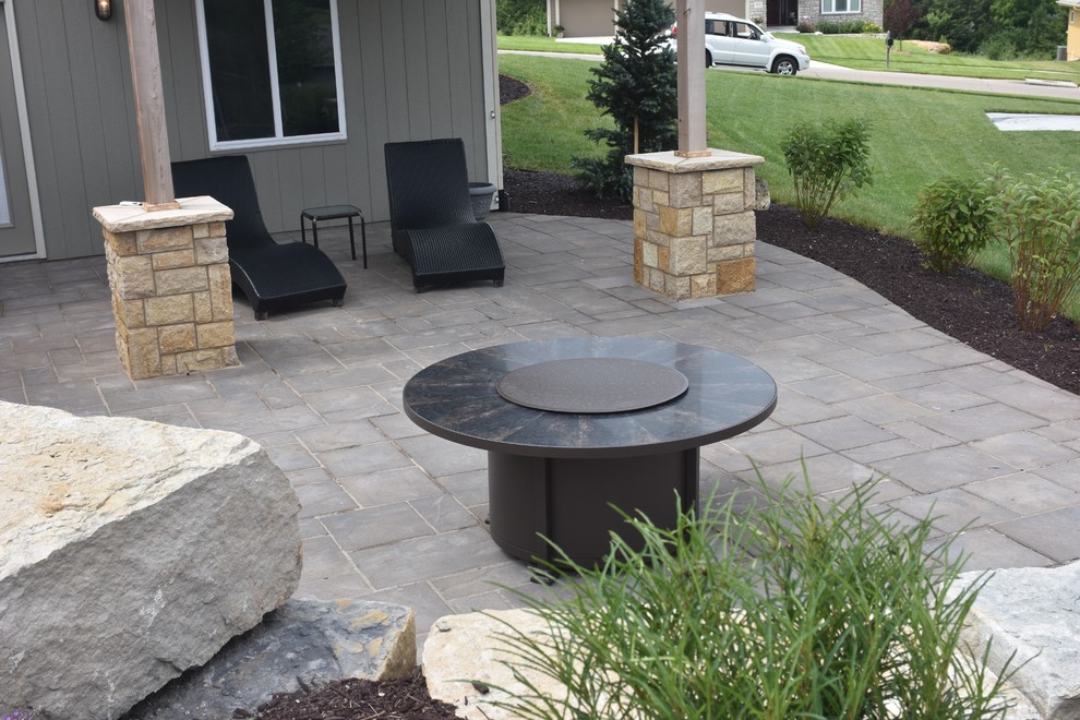 Backyard concrete paver patio photo