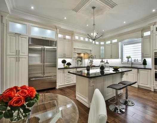 Example of a transitional kitchen design in Toronto