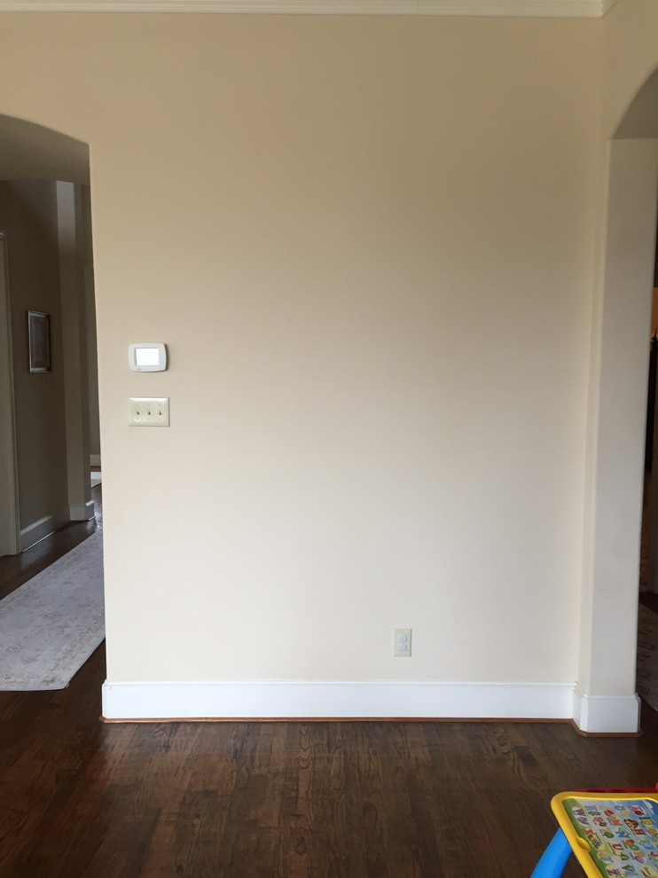 How to center a picture on a wall with a thermostat light switch