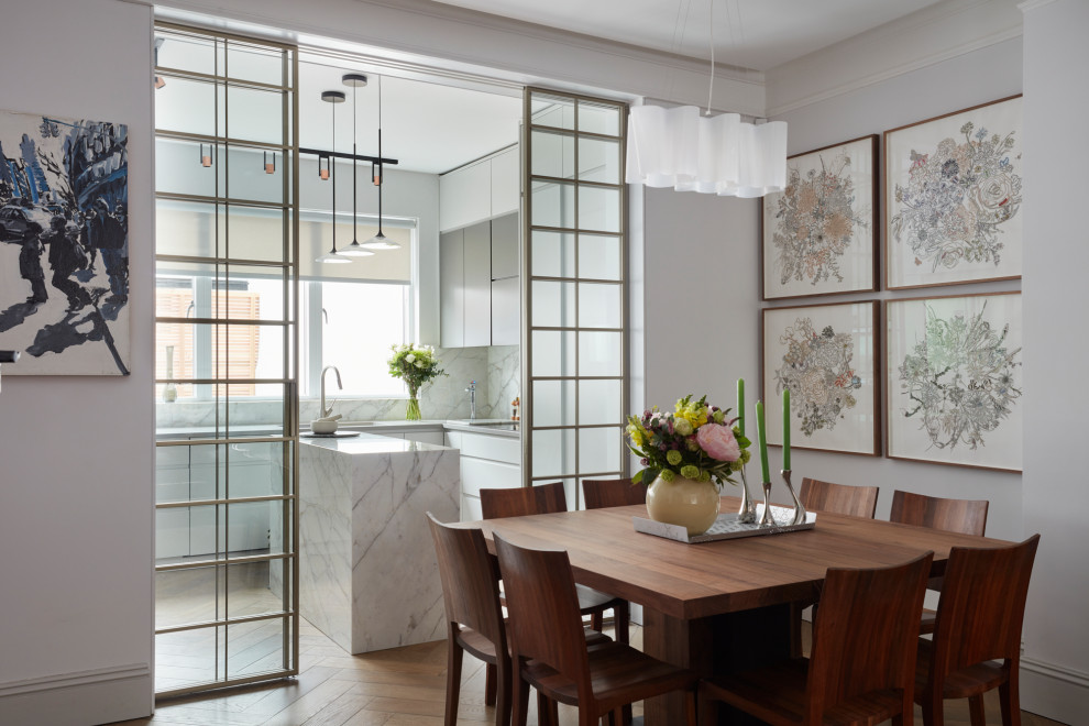 Small contemporary enclosed dining room in London.