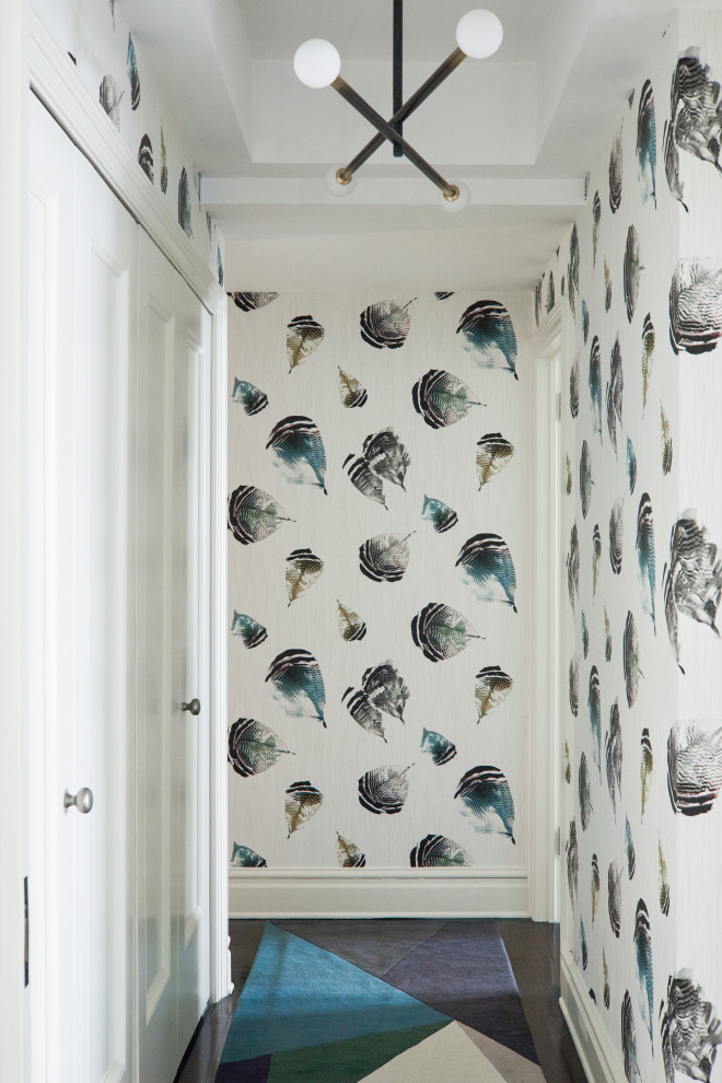 Inspiration for a mid-sized modern wallpaper hallway remodel in New York with multicolored walls