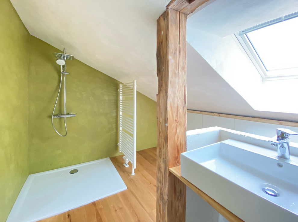 Medium sized rural shower room bathroom in Munich with white cabinets, a walk-in shower, a wall mounted toilet, medium hardwood flooring, a vessel sink, an open shower, a wall niche, a single sink, a floating vanity unit and a wood ceiling.