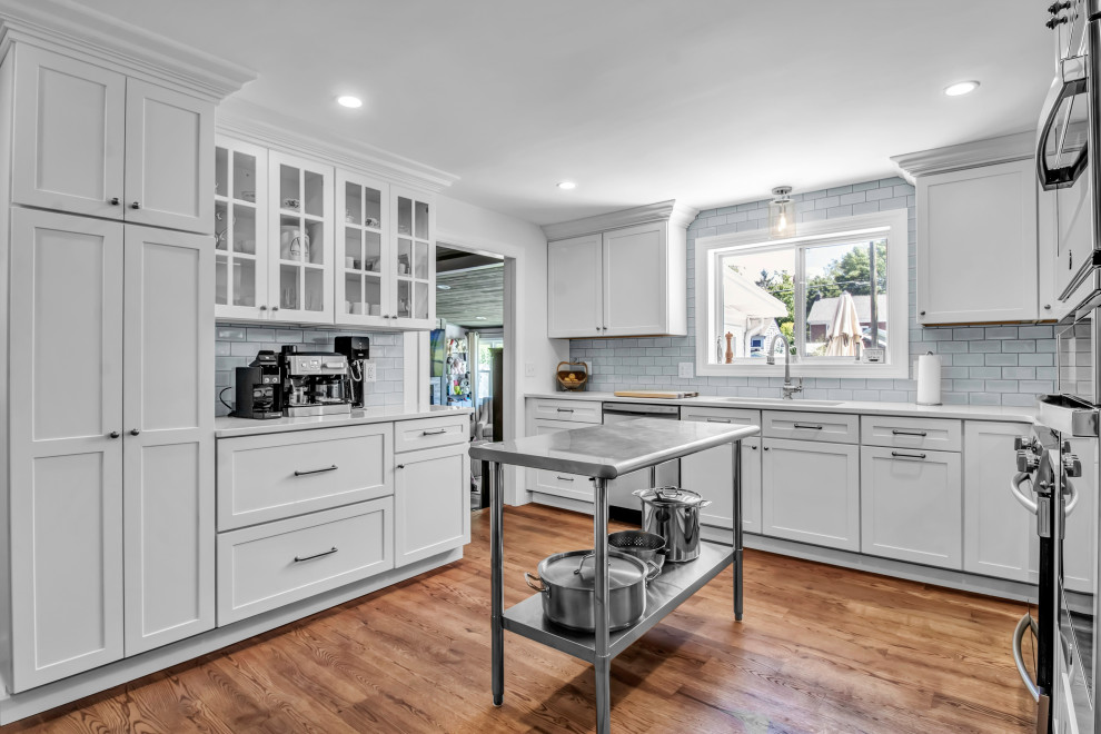 Example of a transitional kitchen design in New York
