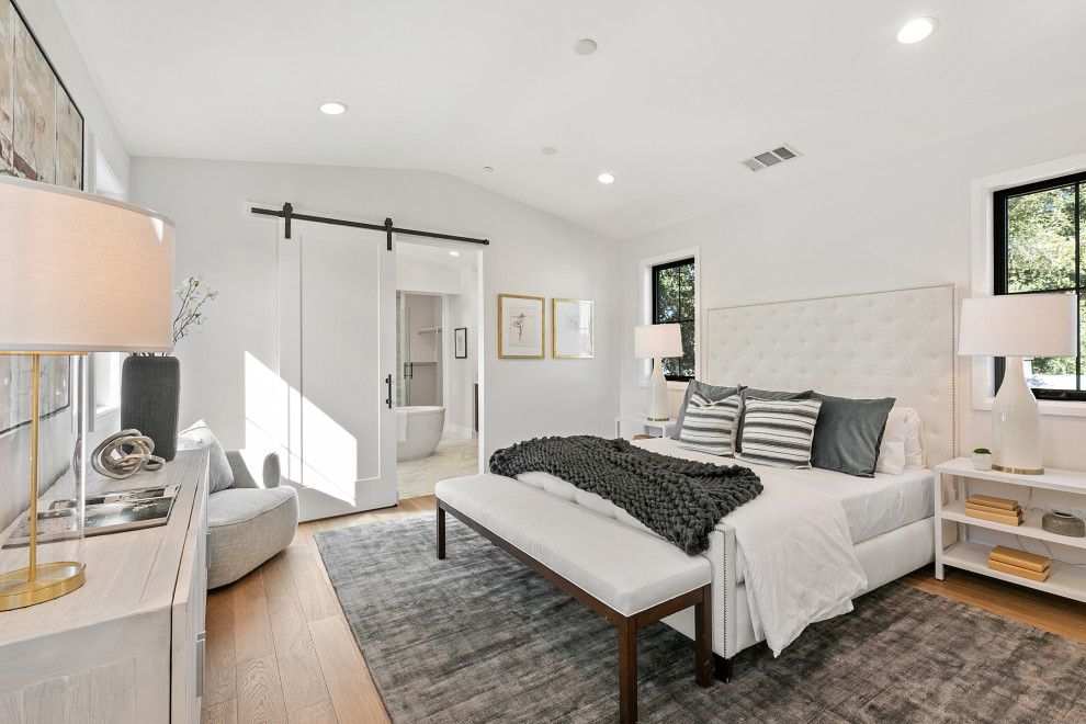 This is an example of a contemporary master bedroom in San Francisco.