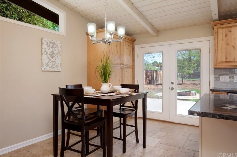 Example of a transitional kitchen design in Orange County