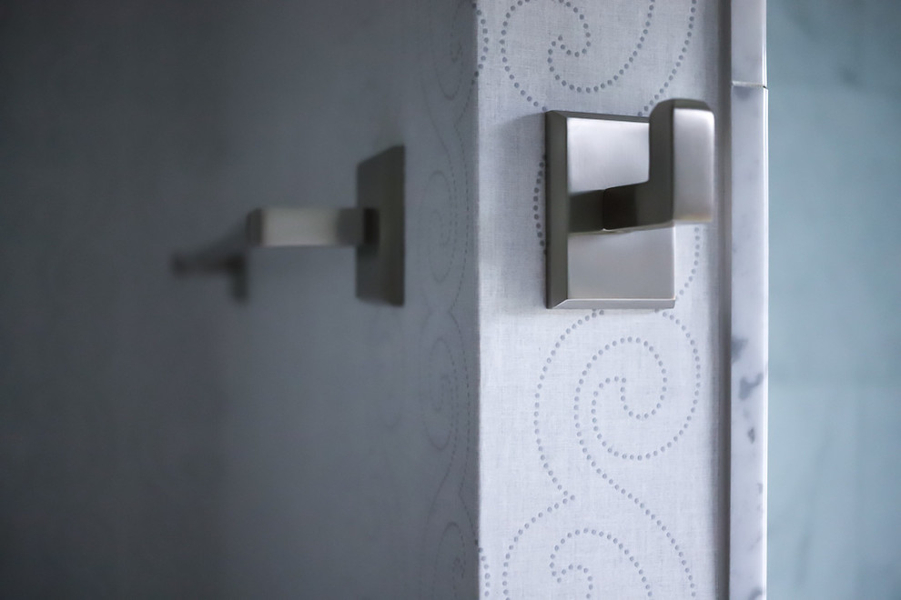 Inspiration for a mid-sized transitional master white tile and marble tile ceramic tile and gray floor alcove bathtub remodel with gray walls, beaded inset cabinets, white cabinets, a two-piece toilet, an undermount sink, quartzite countertops and a hinged shower door