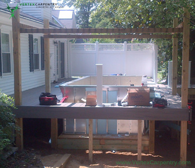Pool fountain - small transitional side yard rectangular infinity pool fountain idea in DC Metro