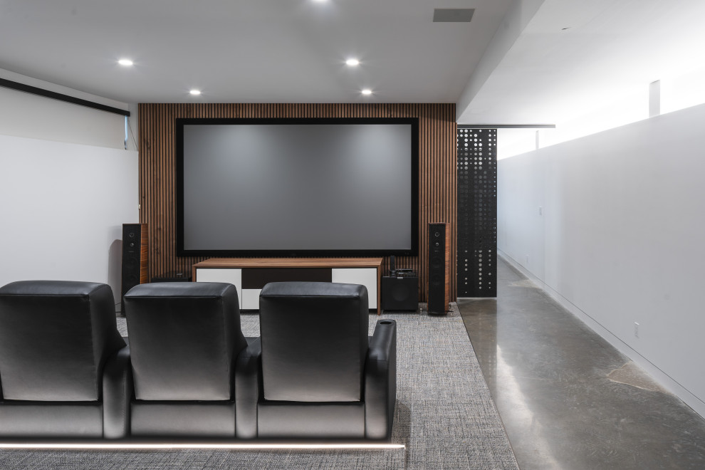 This is an example of a contemporary home cinema in Kansas City.