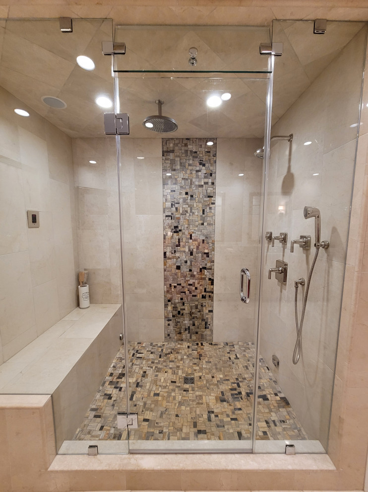 Inspiration for a huge transitional master multicolored tile and mosaic tile travertine floor, white floor, double-sink and tray ceiling bathroom remodel in Boston with louvered cabinets, medium tone wood cabinets, a bidet, beige walls, an undermount sink, granite countertops, a hinged shower door, gray countertops and a built-in vanity