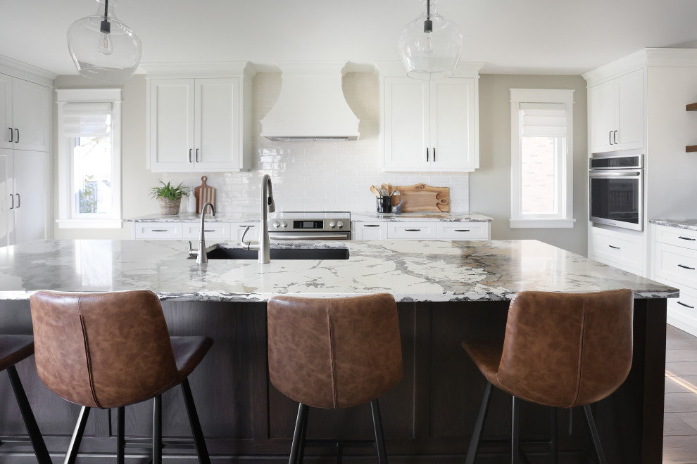 Example of a transitional kitchen design in Toronto