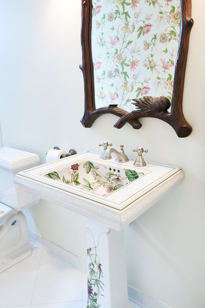 Inspiration for a traditional powder room in Vancouver with white walls and a pedestal sink.