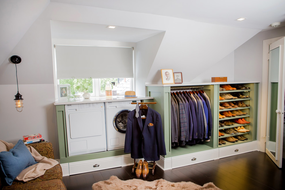 Photo of a large traditional men's walk-in wardrobe in Other with open cabinets, green cabinets, bamboo floors and brown floor.