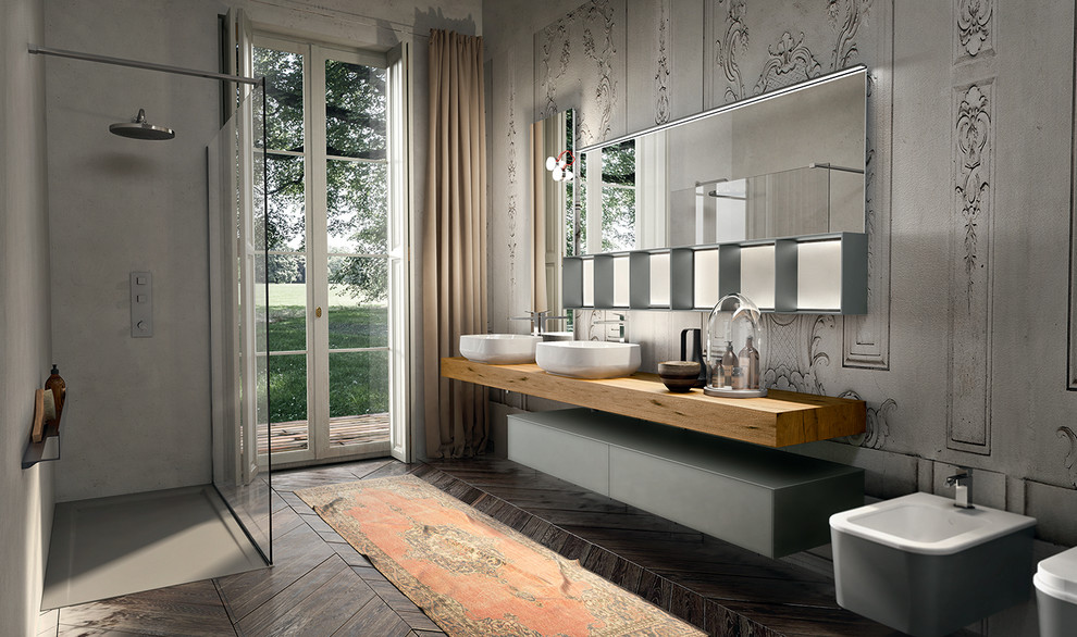 This is an example of a large modern master bathroom in New York with a vessel sink, furniture-like cabinets, light wood cabinets, wood benchtops, a bidet and dark hardwood floors.
