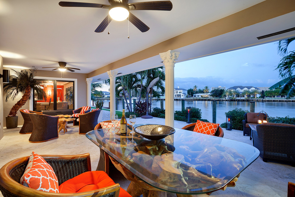 Example of an eclectic patio design in Miami