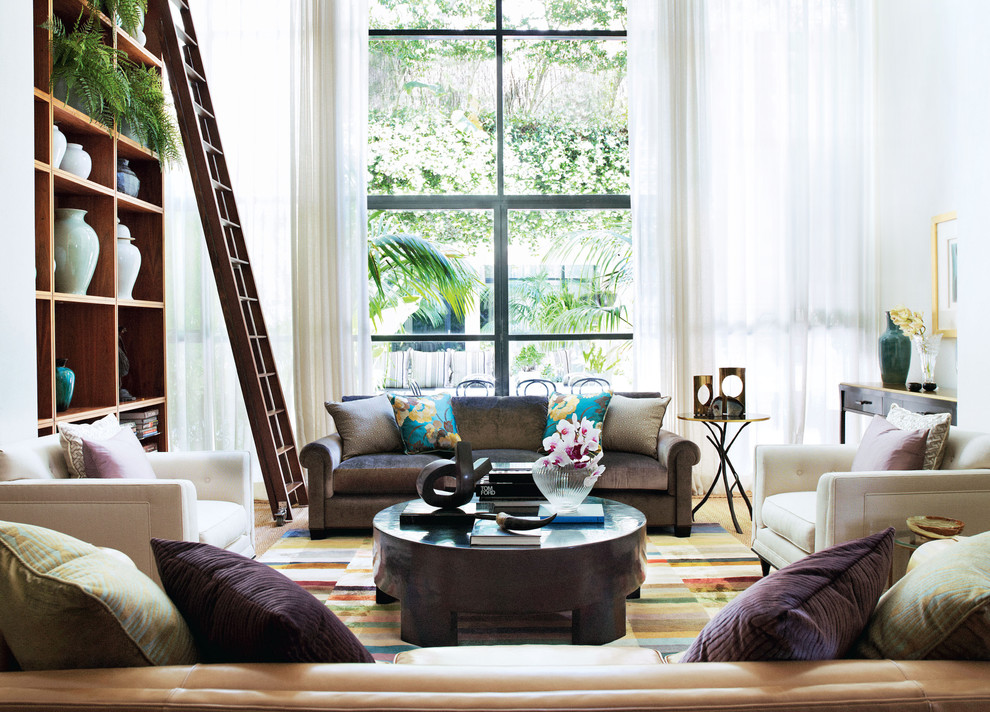 This is an example of a tropical formal living room in Sydney.