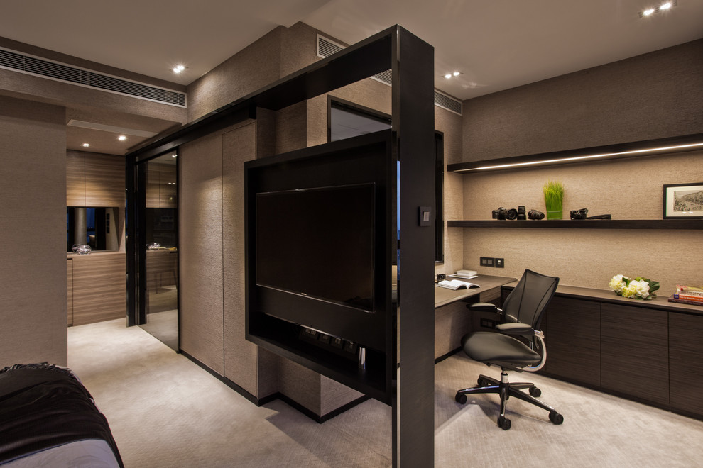 Photo of a contemporary home office in Hong Kong with a built-in desk.
