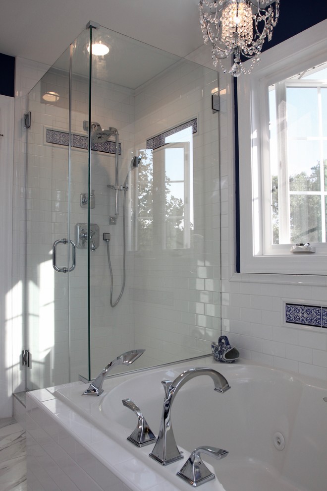 Design ideas for a mid-sized traditional master bathroom with recessed-panel cabinets, white cabinets, a drop-in tub, an open shower, a one-piece toilet, white tile, porcelain tile, blue walls, porcelain floors, an undermount sink, engineered quartz benchtops, grey floor and a hinged shower door.