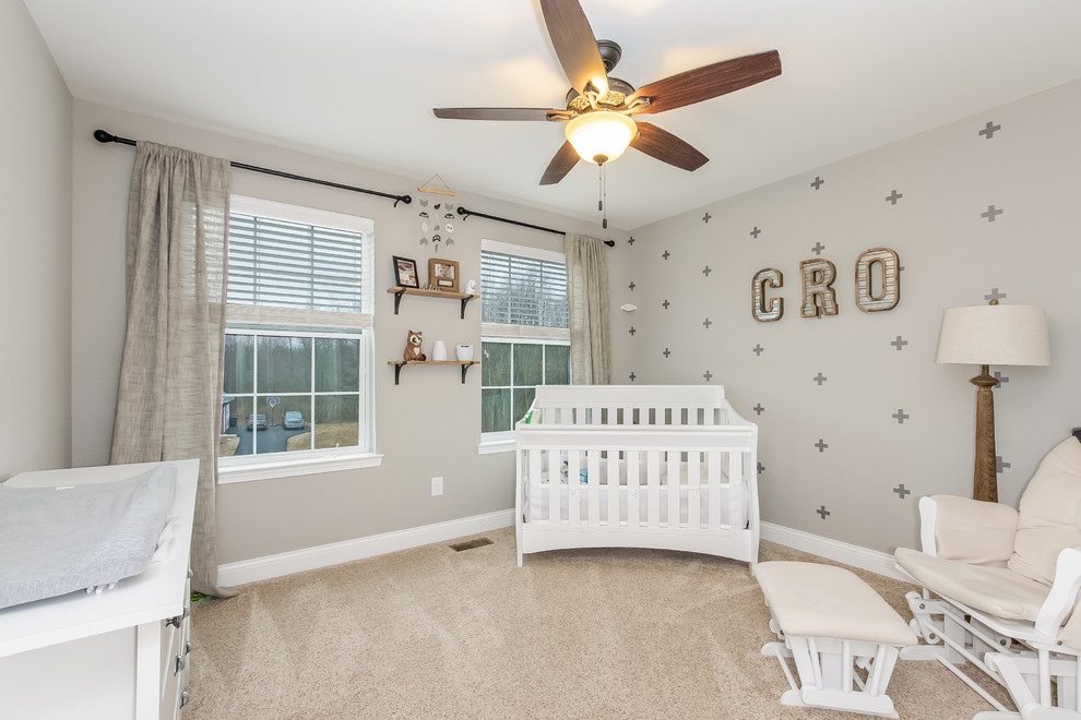 Inspiration for a transitional gender-neutral carpeted and beige floor nursery remodel in Detroit with beige walls