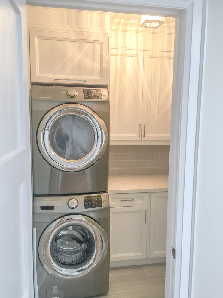 Laundry room - transitional laundry room idea in Toronto