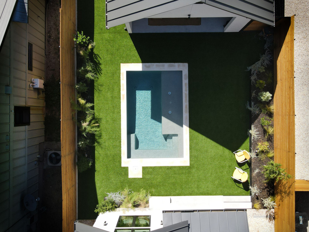 Small minimalist courtyard rectangular pool photo in Austin