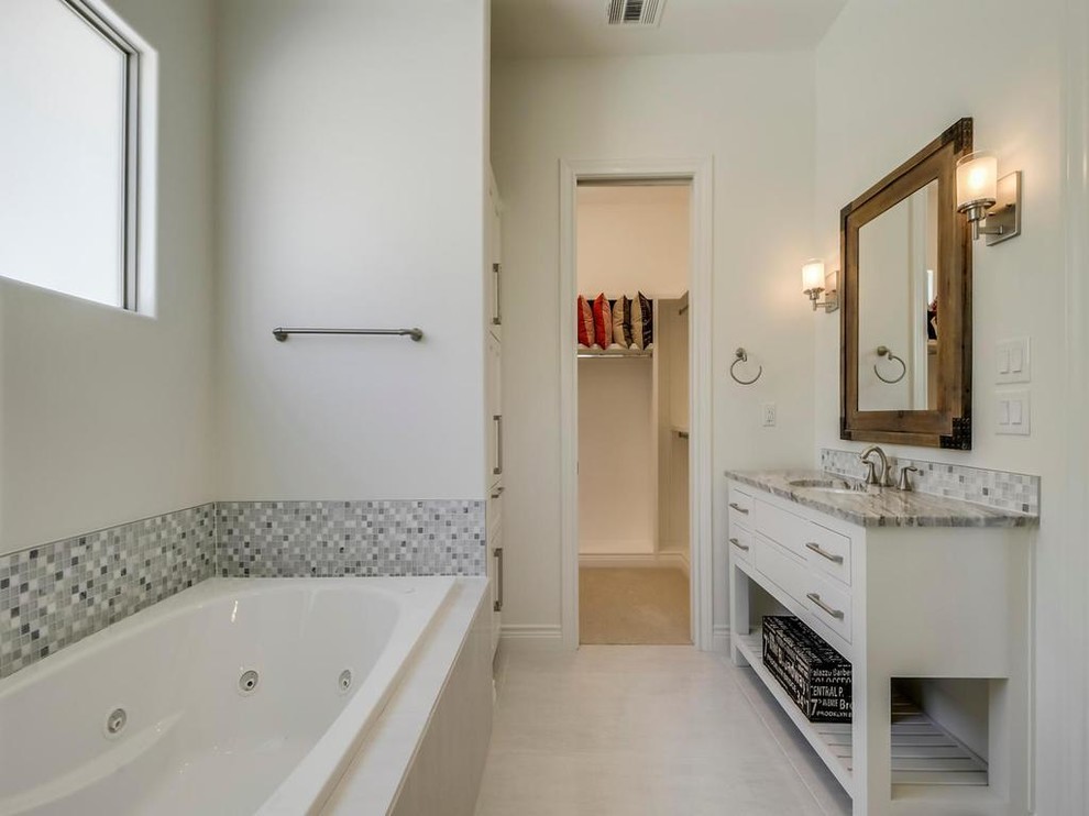 Example of a transitional bathroom design in Austin