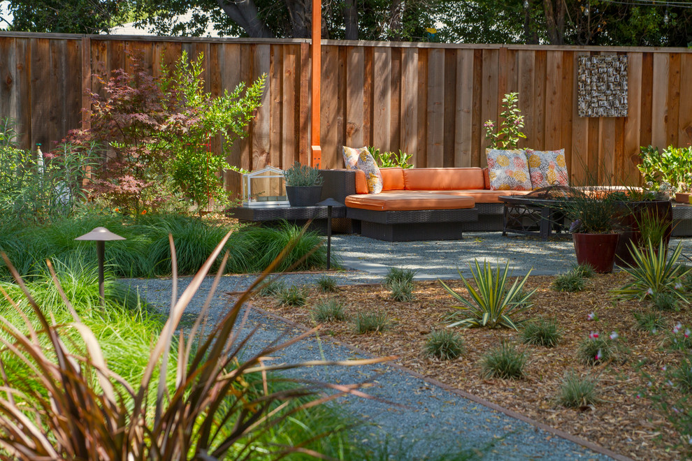 Photo of a mid-sized arts and crafts backyard patio in San Francisco with an outdoor kitchen, gravel and no cover.