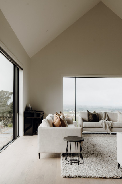 Modern Living Room with High Ceiling and Panoramic Views rustic-living-room