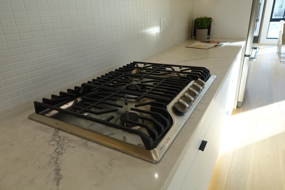 Transitional home design photo in Calgary