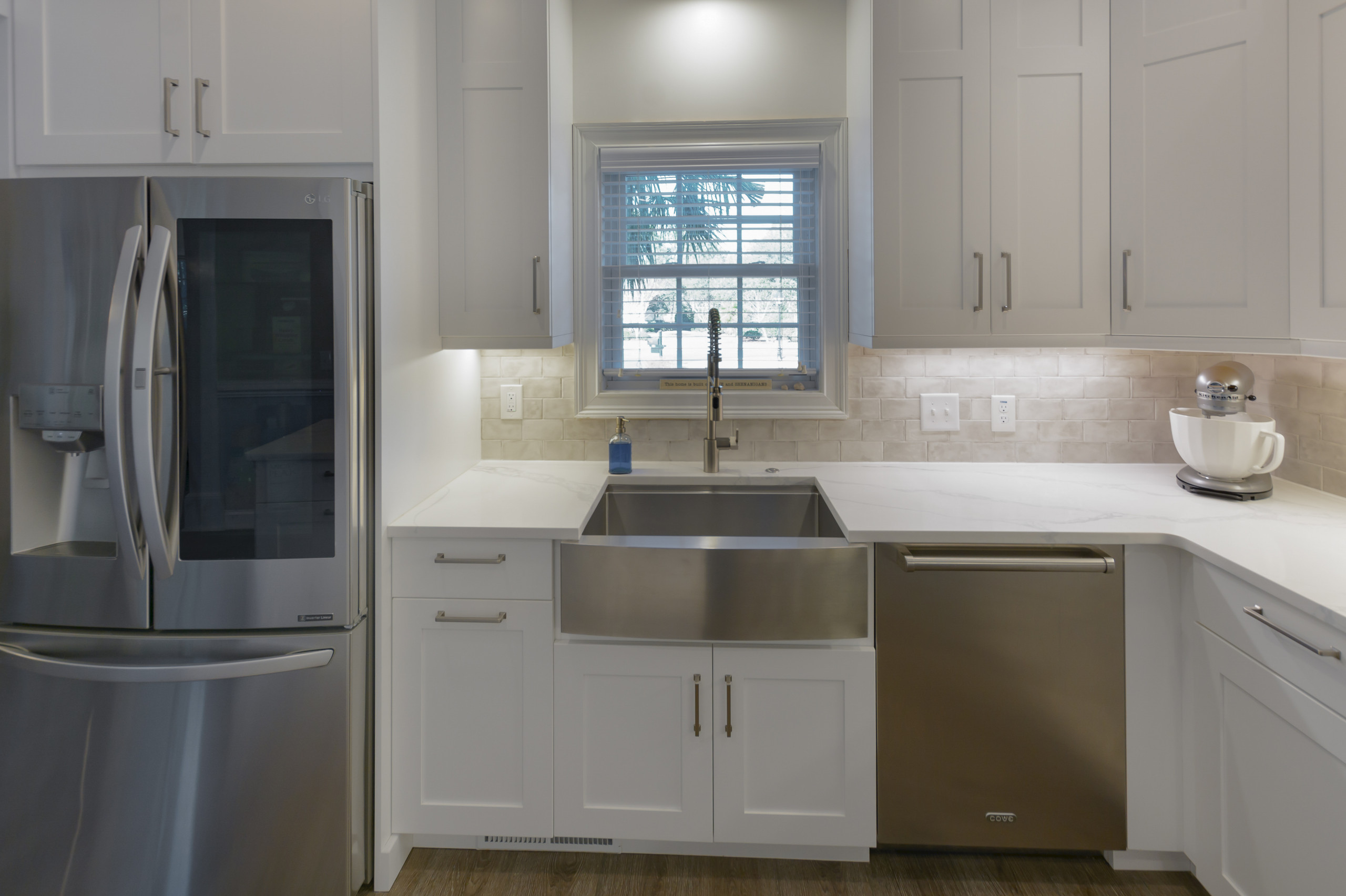 Pawley's Island simple wihite kitchen, laundry room, bathroom, and closet
