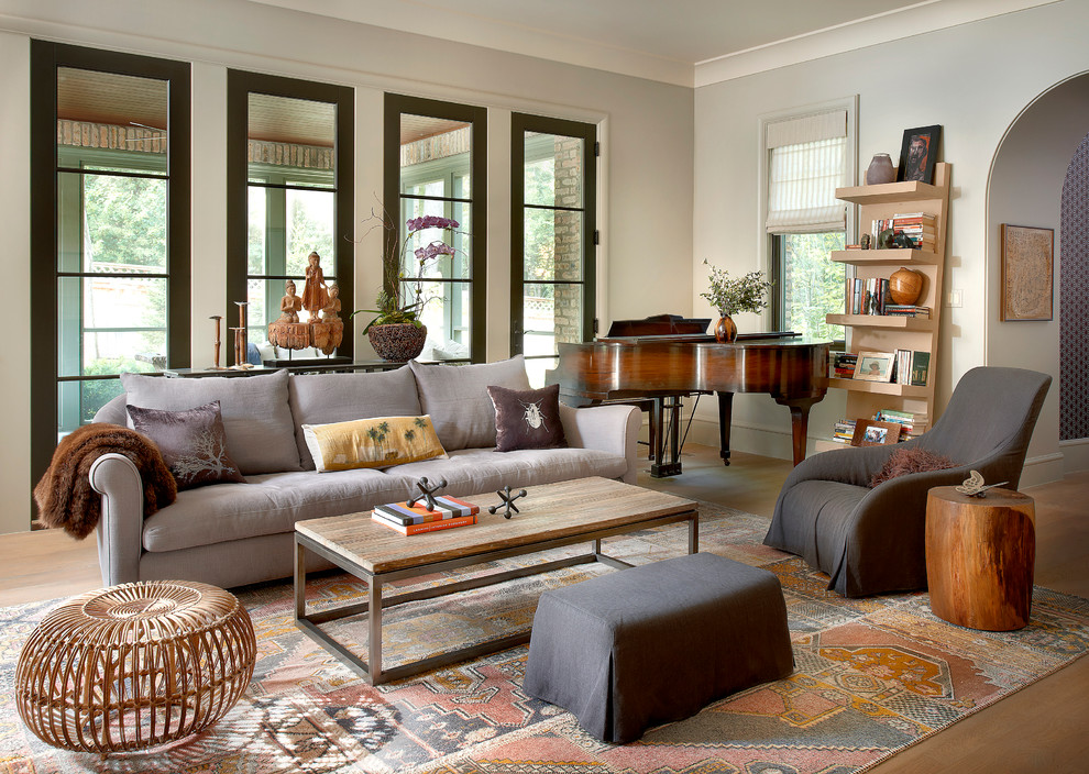 Large transitional open concept light wood floor family room photo in Chicago with gray walls and a music area